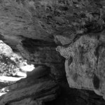'neath the big rock.