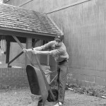 Empying the wheelbarrow.