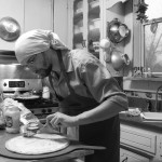 Saucing the crust.