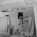 Working on the skylight (below).