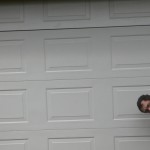 Opening the garage door.