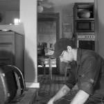 Sweeping up tile mortar.