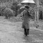 Standing in the rain.
