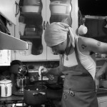 Cooking dinner (at 10 o'clock at night).