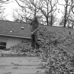 Sweeping off the roof.