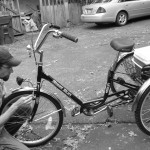 Working on Prince Jazzbo's brakes.