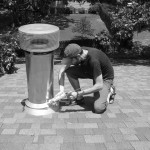 Sealing up the gap around the chimney.