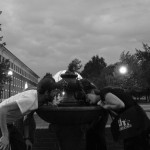 Drinking from the water fountain.