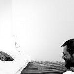 He is trying desperately to ignore me.